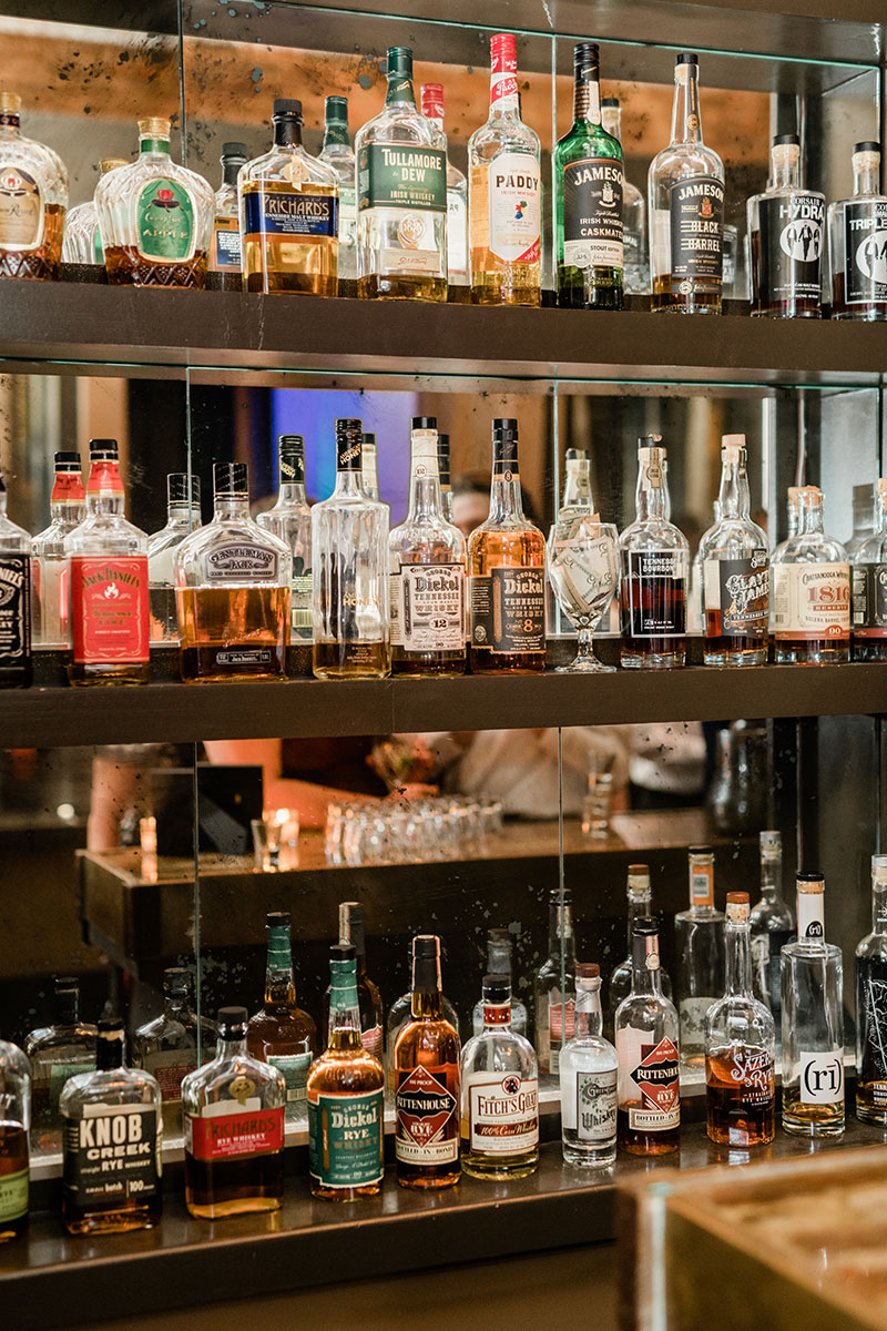 Shelves of whiskey inside The Tasting Room