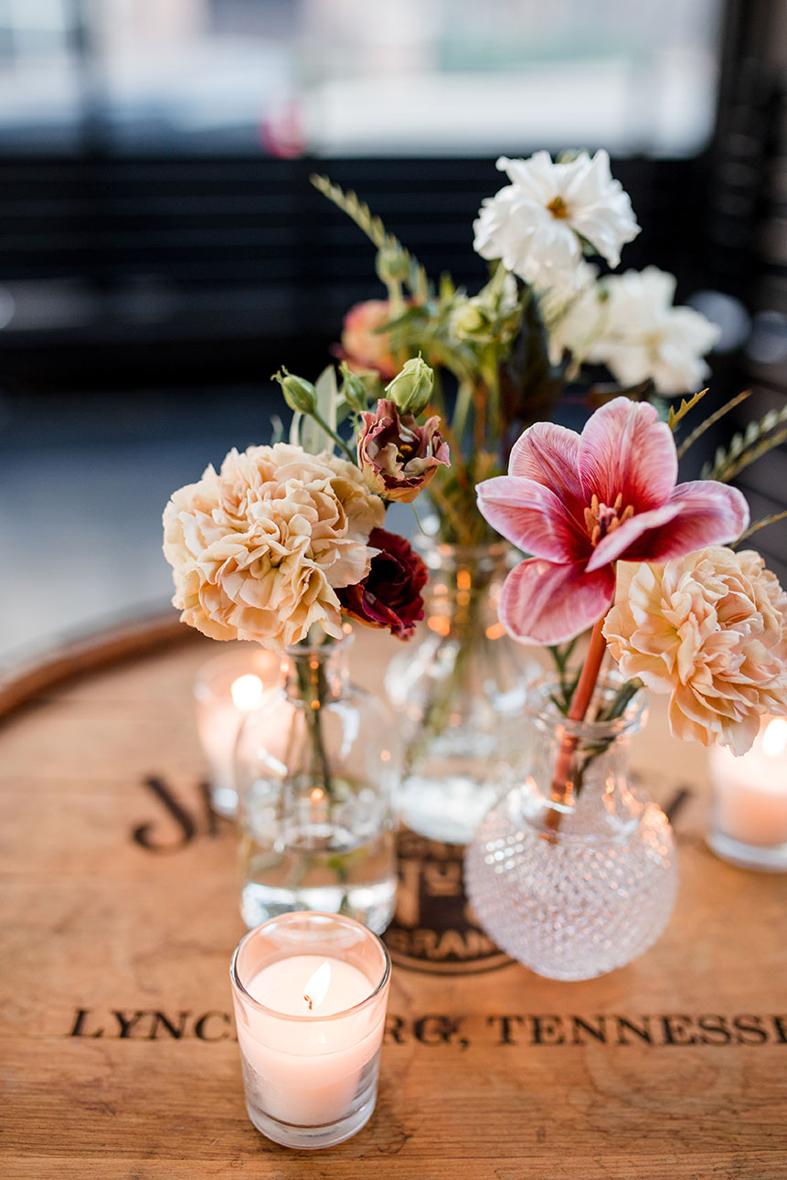 bud vases with bright florals